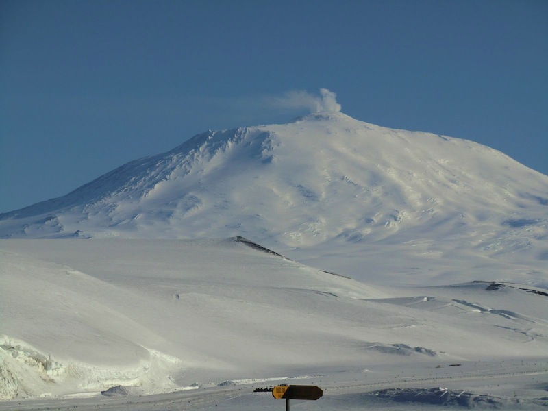 Mt Erebus, the most active volcano in Antarctica, with its signature cloud blowing from the top of the cone. Photo: David Walton.