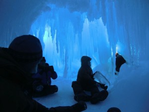 Students in an ice cave on the Erbus Ice Tongue