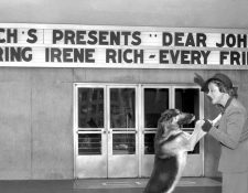 LOS ANGELES - MAY 1: CBS Radio actress Irene Rich at CBS KNX radio studios at Columbia Square, Hollywood, CA. She portrays the character Faith Chandler in Dear John, one of the Irene Rich Dramas on CBS Radio. She is with a German Shepherd dog. May 1, 1942. (Photo by CBS via Getty Images)