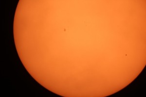 Figure 1: Transit of Mercury photographed on 9 May 2016 from Berry College, GA (USA). Mercury is the tiny black spot on the lower right. Some sunspots are also visible. Photo credit: Todd Timberlake
